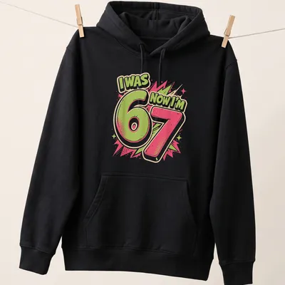 Bold comic style shirt with text celebrating a child's 7th birthday — printed on a unisex hoodie