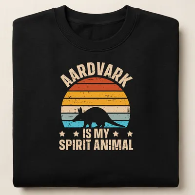 Retro distressed T-shirt featuring an aardvark with playful text about spirit animals — printed on a unisex sweatshirt