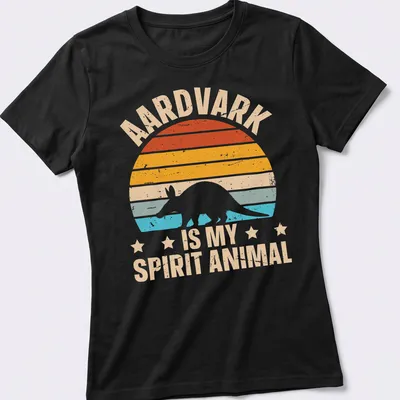 Retro distressed T-shirt featuring an aardvark with playful text about spirit animals — printed on a women's shirt
