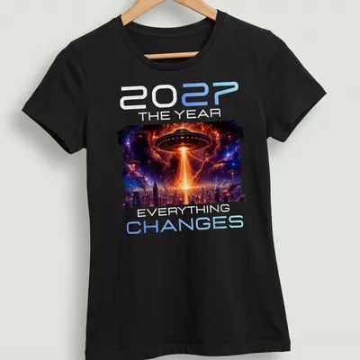 Sci-fi design featuring an alien UFO with bold text: '2027 THE YEAR EVERYTHING CHANGES' — printed on a women's shirt