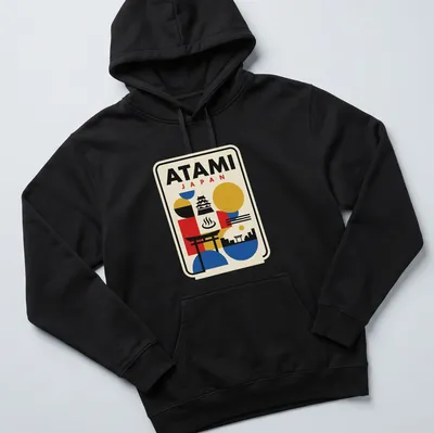 Retro Bauhaus style t-shirt featuring a geometric skyline of Atami, Japan with vibrant colors. — printed on a unisex hoodie
