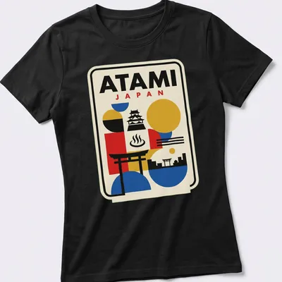 Retro Bauhaus style t-shirt featuring a geometric skyline of Atami, Japan with vibrant colors. — printed on a women's shirt