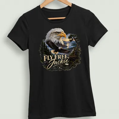 Realistic print of a Bald Eagle flying with text FLY FREE, Jackie BIG BEAR CALIFORNIA — printed on a women's shirt