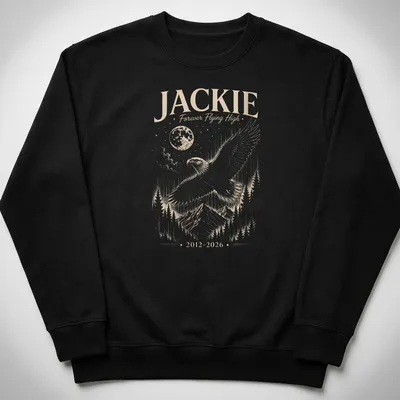 Detailed illustration of a Bald Eagle soaring with text about Jackie. — printed on a unisex sweatshirt
