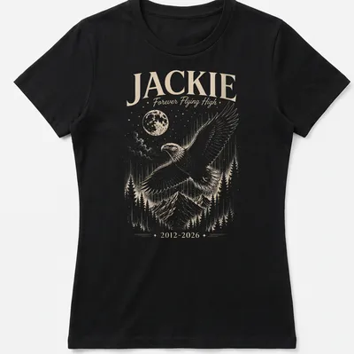 Detailed illustration of a Bald Eagle soaring with text about Jackie. — printed on a women's shirt