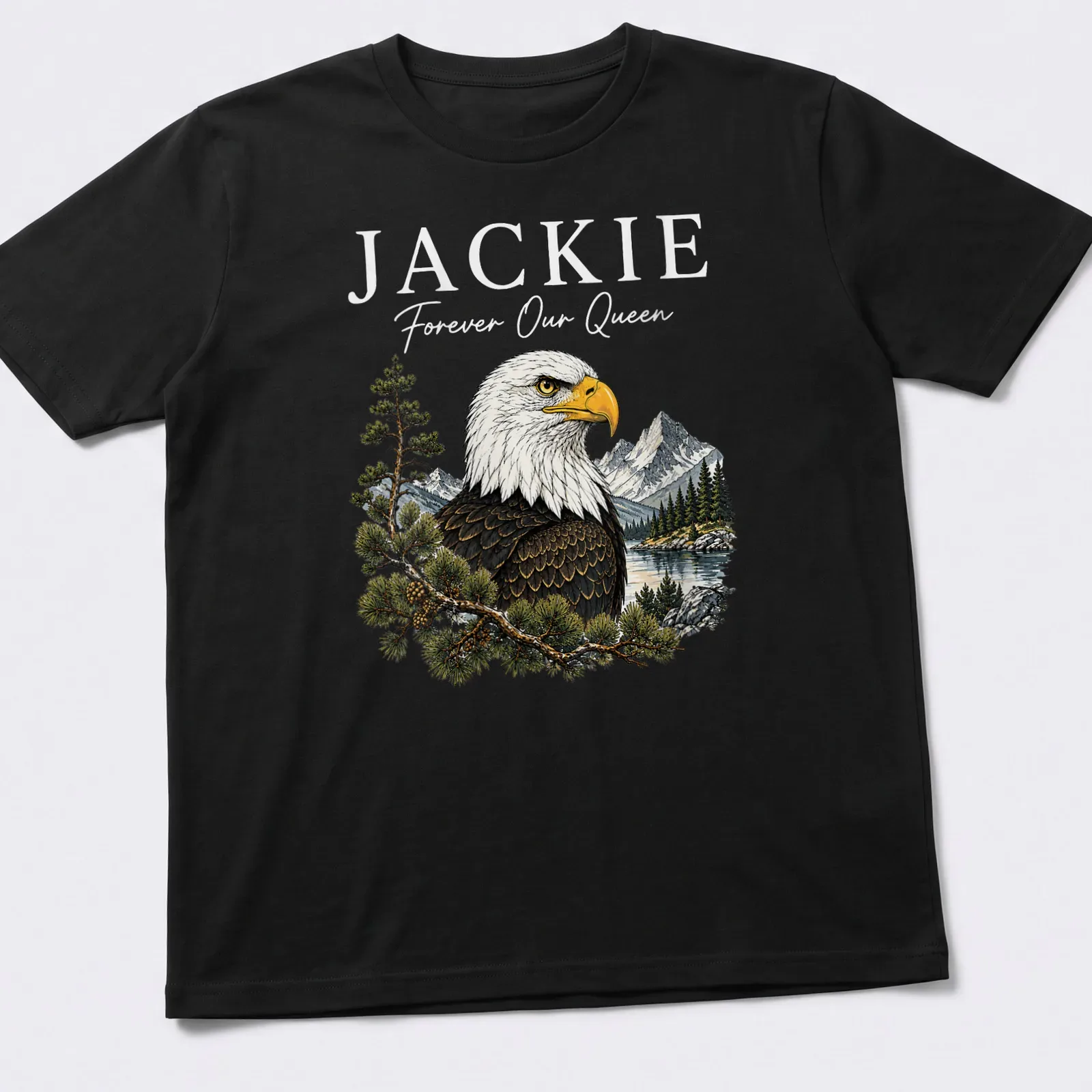 Illustration of a Bald Eagle with 'Jackie Forever Our Queen' text in vibrant colors — printed on a unisex t-shirt