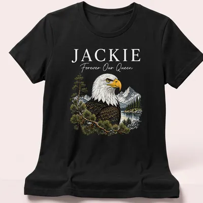 Illustration of a Bald Eagle with 'Jackie Forever Our Queen' text in vibrant colors — printed on a women's shirt