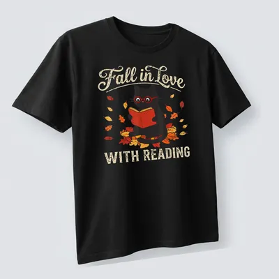 Retro design featuring a black cat with fall leaves and the text 'Fall in Love WITH READING' — printed on a unisex t-shirt (angled view)