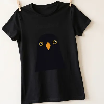 Minimalist design featuring a blackbird with the word Blackbird in stylish typography. — printed on a women's shirt