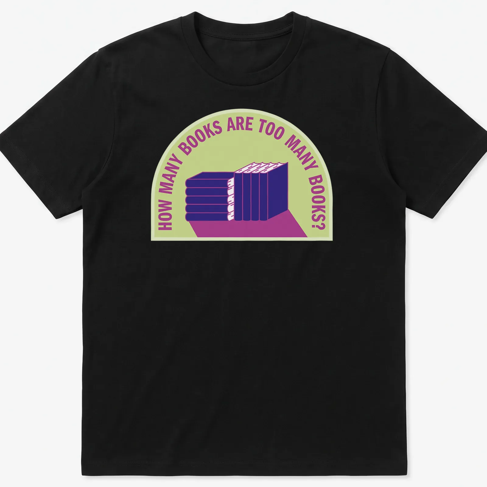 Bold typography t-shirt with humorous text about book collecting over a stack of books — printed on a unisex t-shirt