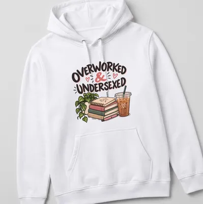 Illustrative design featuring books and coffee with the phrase 'Overworked & Undersexed' in fun typography — printed on a unisex hoodie
