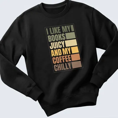 Retro typography T-shirt with the text 'I LIKE MY BOOKS JUICY AND MY COFFEE CHILLY' — printed on a unisex sweatshirt