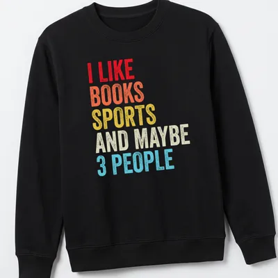 Colorful typography shirt stating I Like Books Sports And Maybe 3 People — printed on a unisex sweatshirt