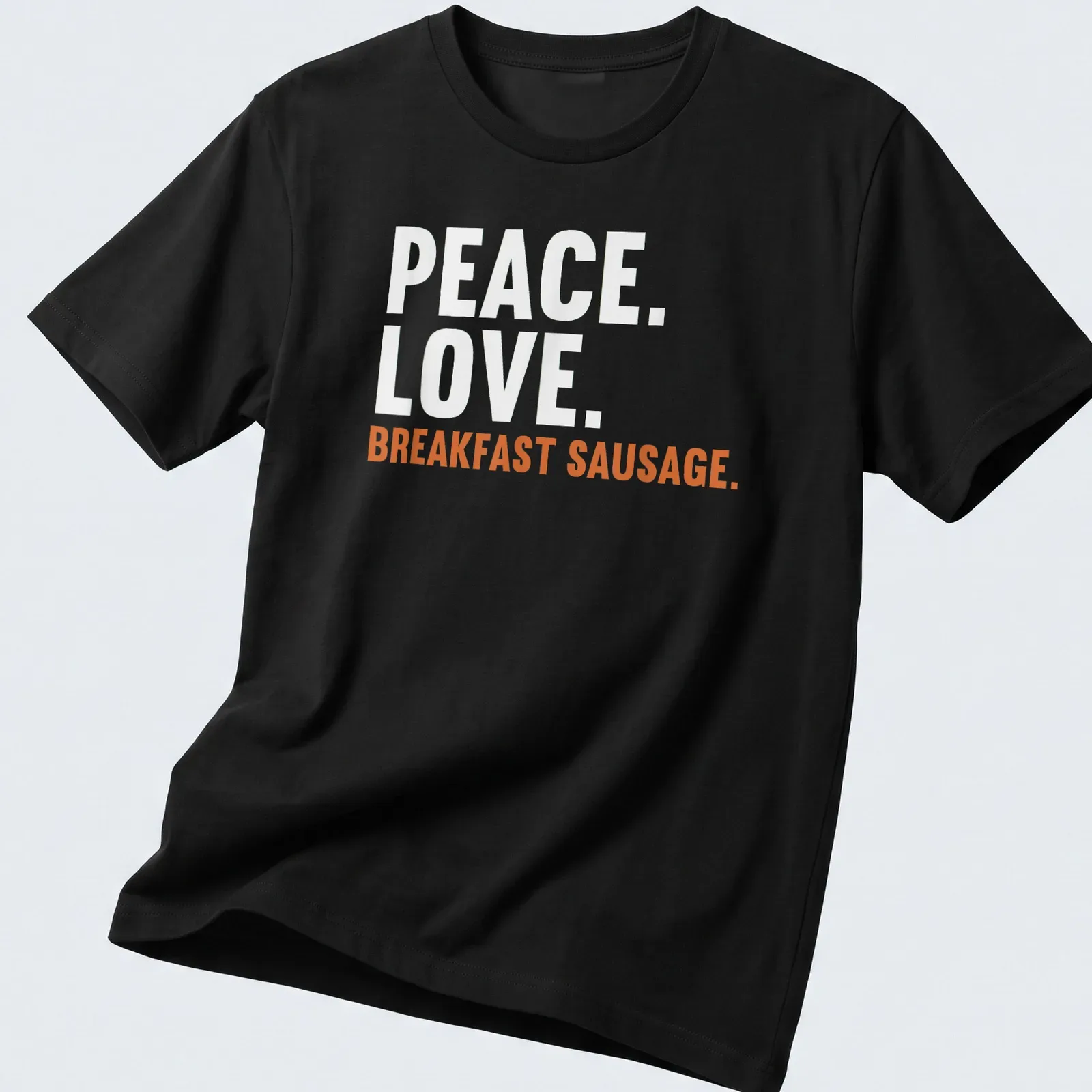 Bold text design featuring 'Peace. Love. Breakfast Sausage.' on a white tee. — printed on a unisex t-shirt