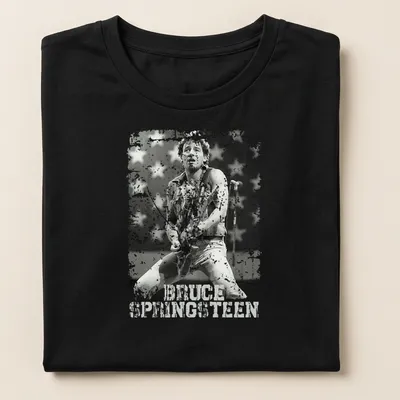 Retro vintage tee featuring Bruce Springsteen in distressed print — printed on a women's shirt