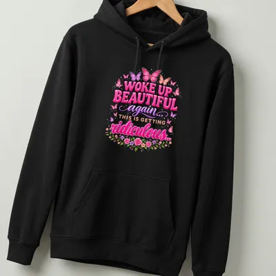 Colorful butterflies and whimsical text on a nature-inspired t-shirt. — printed on a unisex hoodie