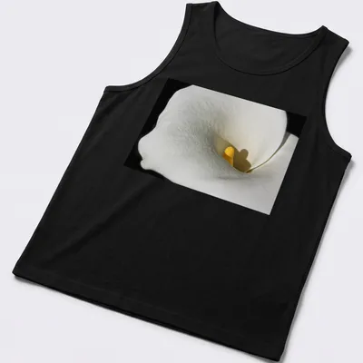 Realistic photography of a Calla Lily in white and yellow against a black background — printed on a tank top