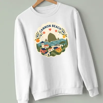 Illustration of Cannon Beach landscape in modern folk art style with vibrant colors — printed on a unisex sweatshirt
