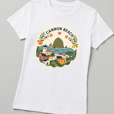 Illustration of Cannon Beach landscape in modern folk art style with vibrant colors — printed on a women's shirt