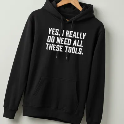 Bold typography Carpenter T-shirt with a humorous message about tools — printed on a unisex hoodie