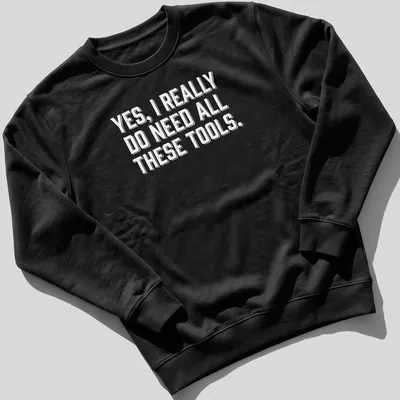 Bold typography Carpenter T-shirt with a humorous message about tools — printed on a unisex sweatshirt