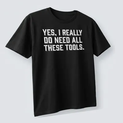 Bold typography Carpenter T-shirt with a humorous message about tools — printed on a unisex t-shirt (angled view)