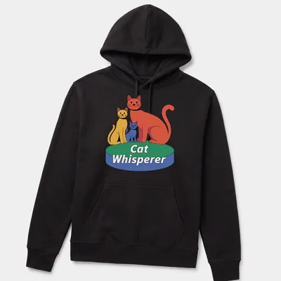 Playful cartoon design with the text 'Cat Whisperer' surrounded by sketches of cats in red, yellow, blue, and green. — printed on a unisex hoodie