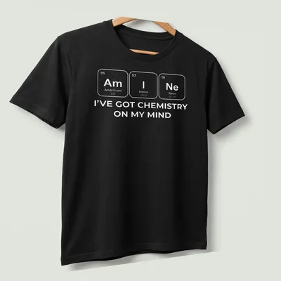 Chemistry-themed t-shirt with white text and elements design — printed on a unisex t-shirt (angled view)