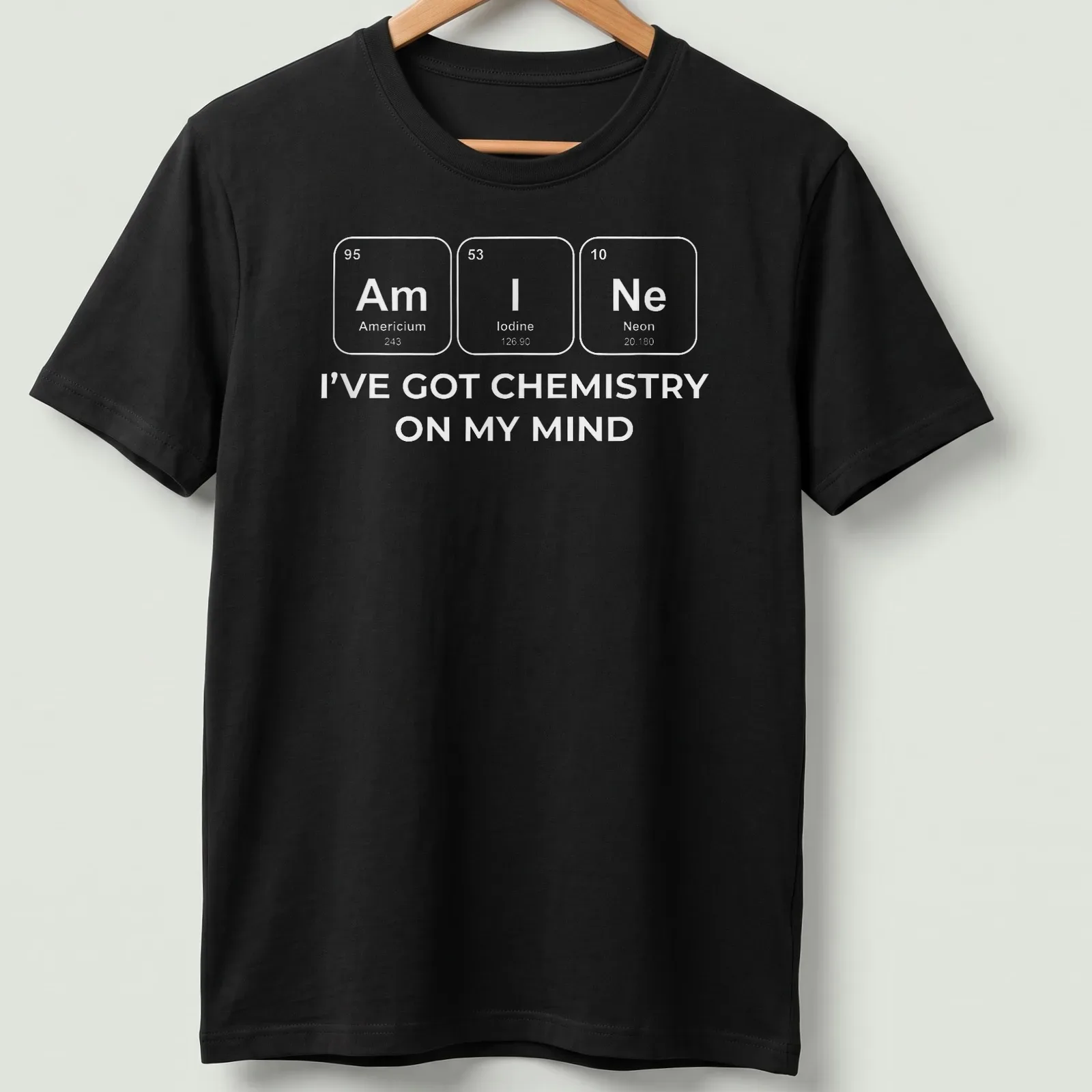 Chemistry-themed t-shirt with white text and elements design — printed on a unisex t-shirt