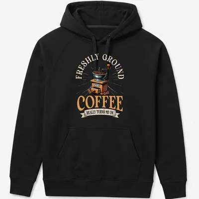 Coffee-themed vintage t-shirt featuring a humorous coffee grinder illustration — printed on a unisex hoodie
