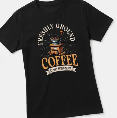 Coffee-themed vintage t-shirt featuring a humorous coffee grinder illustration — printed on a women's shirt