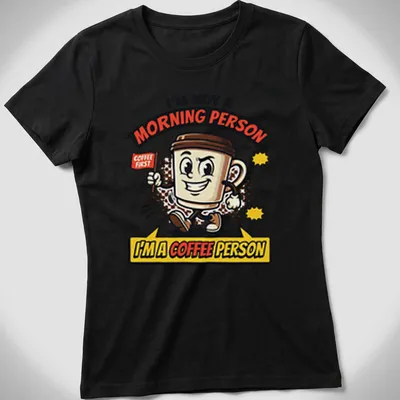 Cartoon coffee cup with the phrase I'm Not A Morning Person I'm A Coffee Person — printed on a women's shirt