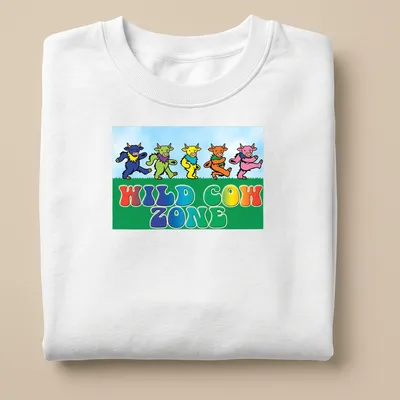 Cartoonish colorful cows dancing with text 'WILD COW ZONE' — printed on a unisex sweatshirt