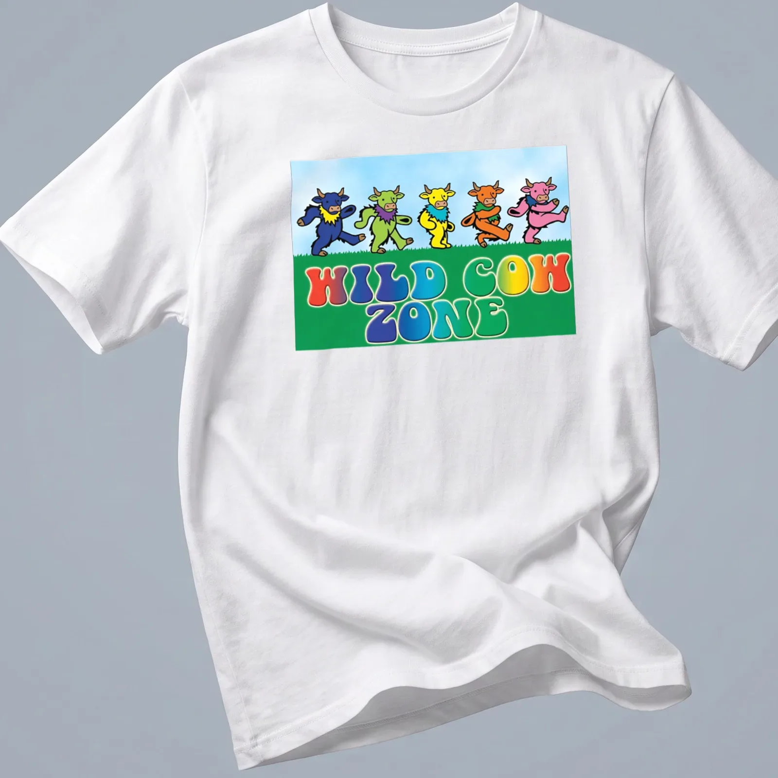 Cartoonish colorful cows dancing with text 'WILD COW ZONE' — printed on a unisex t-shirt