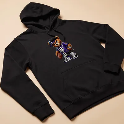 Cartoon bear in hip hop style on a t-shirt with purple, black, white, and gold. — printed on a unisex hoodie