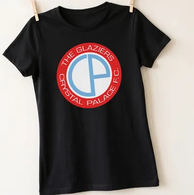 Crystal Palace F.C. logo in red and light blue on a white background — printed on a women's shirt