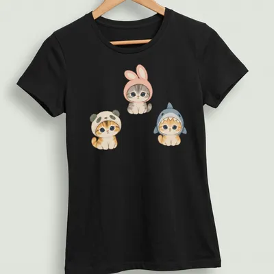 Watercolor print of cute kittens dressed as a panda, bunny, and shark — printed on a women's shirt