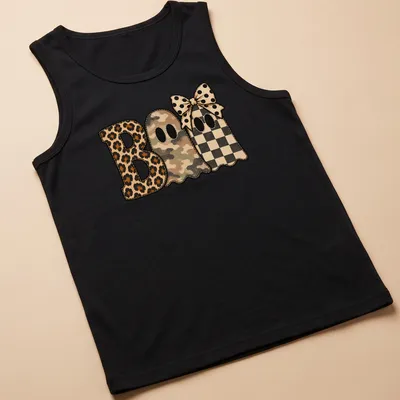 Whimsical patchwork shirt featuring cute ghosts and 'Boo' text in various patterns — printed on a tank top