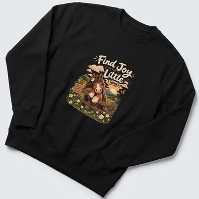 Whimsical horse illustration with uplifting text in warm colors — printed on a unisex sweatshirt
