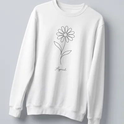 Minimalist line art of a daisy and the word April in black and white — printed on a unisex sweatshirt