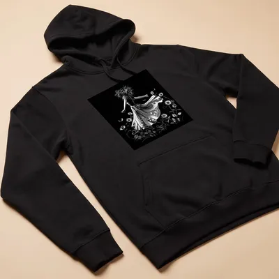 Black and white illustration of a dancer in a flowing dress among sunflowers — printed on a unisex hoodie