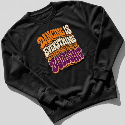 Bold typography DANCING IS EVERYTHING EVERYTHING ELSE IS BULLSHIT t-shirt in orange, cream, and purple — printed on a unisex sweatshirt