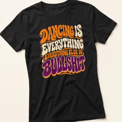 Bold typography DANCING IS EVERYTHING EVERYTHING ELSE IS BULLSHIT t-shirt in orange, cream, and purple — printed on a women's shirt