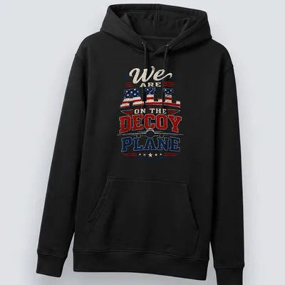 Vintage distressed T-shirt with a decoy plane and bold patriotic text — printed on a unisex hoodie