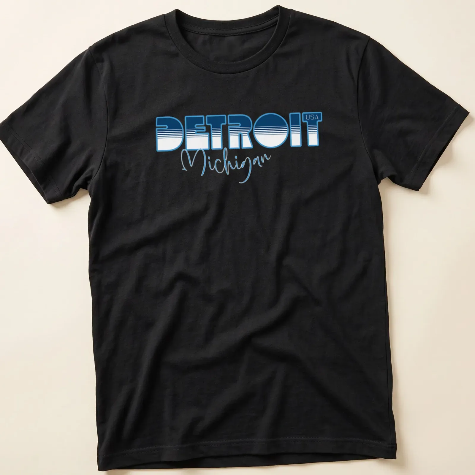 Modern bold print of Detroit Michigan USA in blue and white. — printed on a unisex t-shirt
