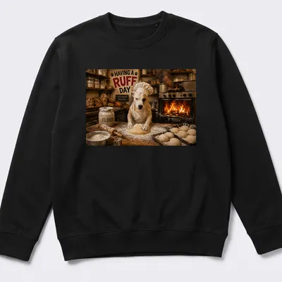 Photorealistic illustration of a dog baking bread with the text 'HAVING A RUFF DAY' — printed on a unisex sweatshirt