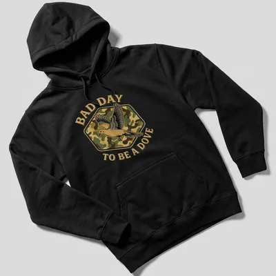 Camo print shirt featuring a dove and the text 'BAD DAY TO BE A DOVE' — printed on a unisex hoodie