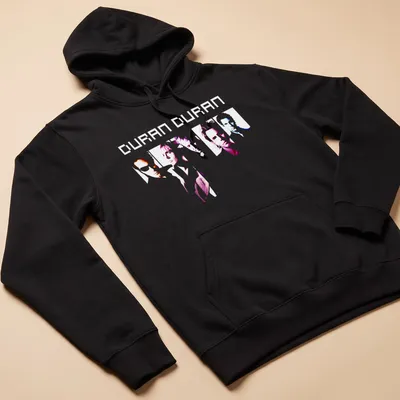 Minimalist line-art tee featuring Duran Duran band members in pink, blue, white, and purple — printed on a unisex hoodie