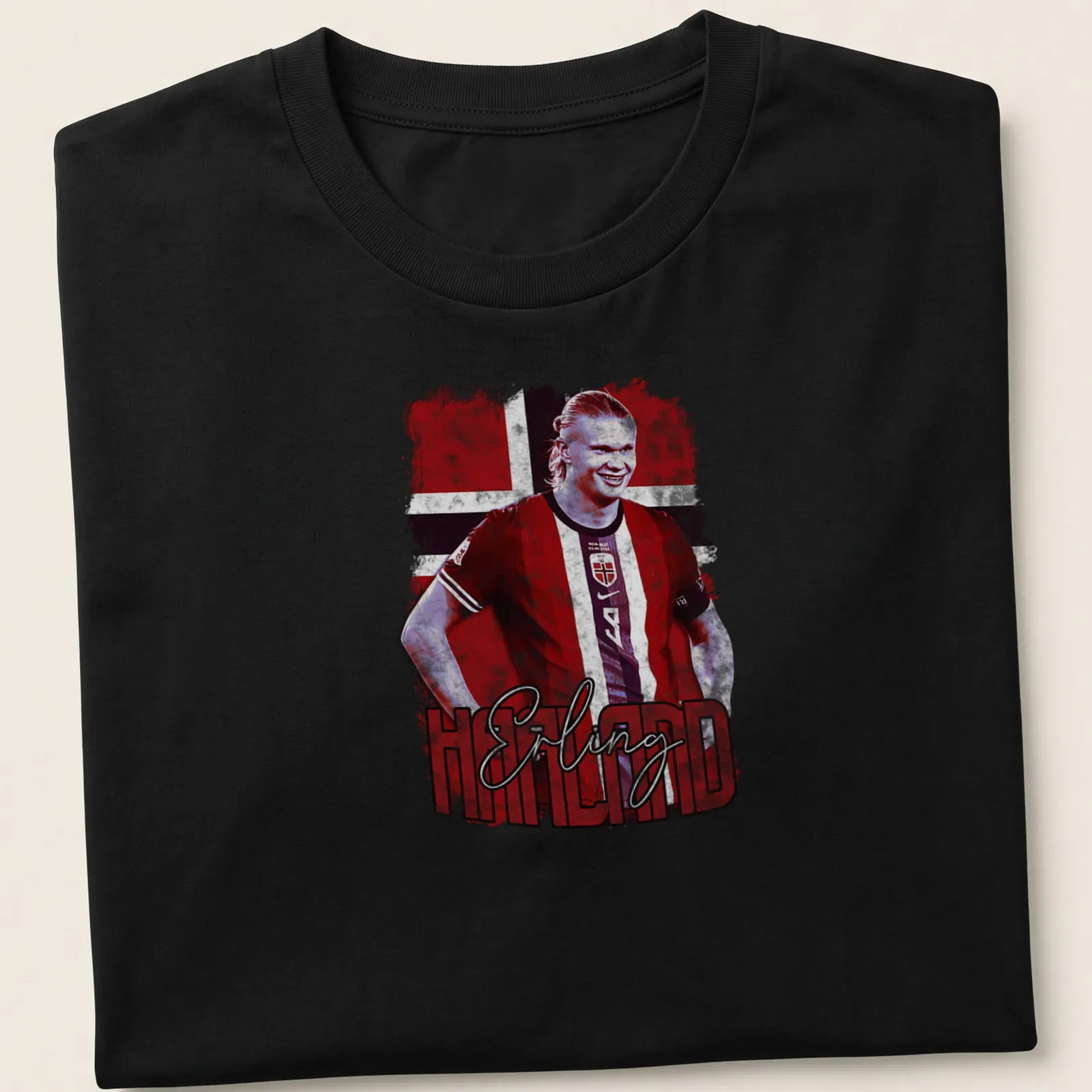 Vintage print shirt featuring Erling Haaland's name in red, white, and blue — printed on a unisex t-shirt