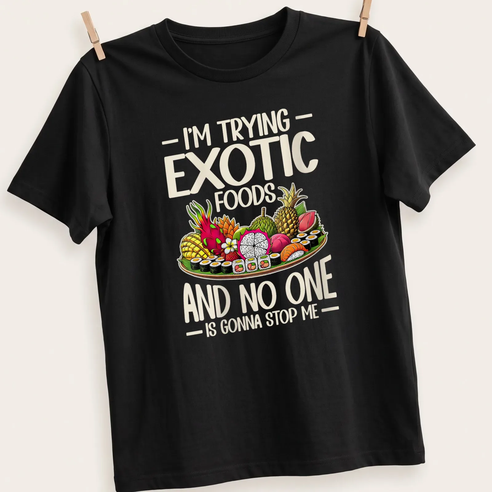 Colorful T-shirt featuring sushi and exotic fruits with playful text. — printed on a unisex t-shirt